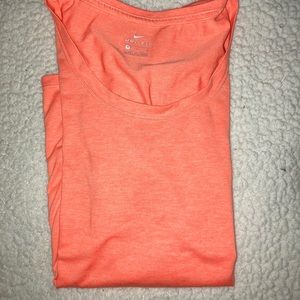 Orange Nike short sleeve shirt